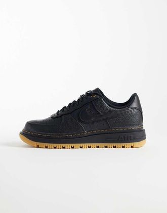 Nike Air - Force 1 Luxe - Sneakers con suola in gomma spessa, colore nero