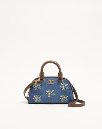 Valentino Garavani Mini bauletto Valentino Garavani VLogo Signature in denim con ricamo floreale Donna DENIM UNI