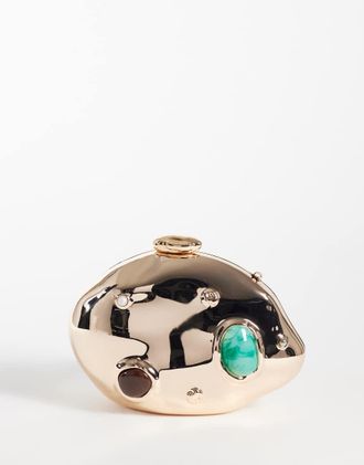True Decadence Pochette rigida oro metallizzato con inserti in pietra