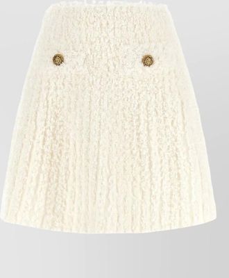 Balmain plumetis tweed skirt textured buttons gold