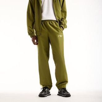 New Balance Uomo Trackside Woven Pant in Verde, Politessuto, Taglia 2XL
