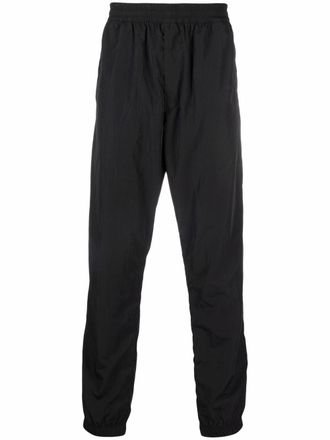 Givenchy logo-embroidered trackpants - men - Polyester/Polyamide - 54 - Black
