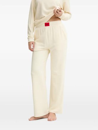 HUGO BOSS logo-patch trousers - Beige