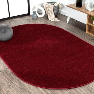 Jonathan Y Designs Haze Solid Low-Pile Oval Area Rug in Red/vermillion at Nordstrom, Size 5Ft 0In X 8Ft 0In