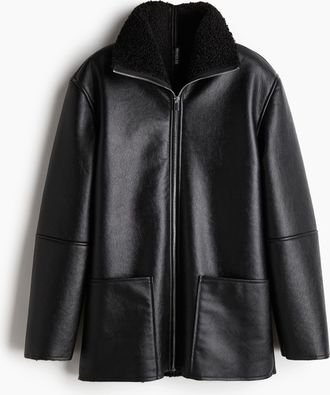 H&M Jacke mit Coating und Teddyfleece-Futter - Schwarz