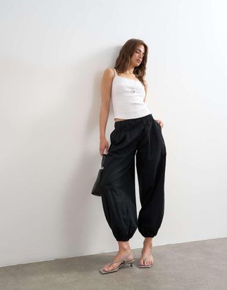 Topshop Pantaloni a palloncino in popeline neri-Nero