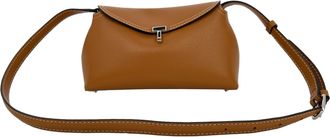 Toteme T-Lock Clutch van generfd leer in lichtbruin leer