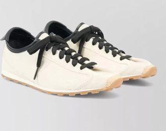 Jacquemus organic cotton sneakers contrast heel detail