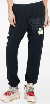 Freecity Spryum lettering-print track pants - Black