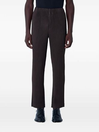 Homme Pliss&eacute; Issey Miyake pleated elasticated-waist straight-leg trousers - Brown