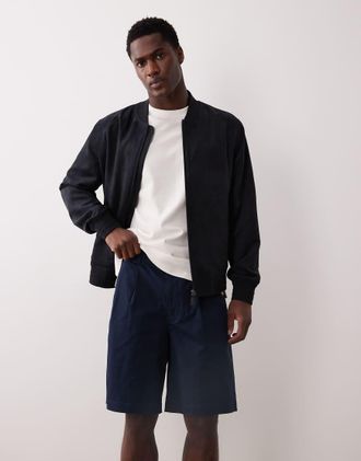 Calvin Klein Jeans Pantaloncini chino da 9 blu navy a pieghe