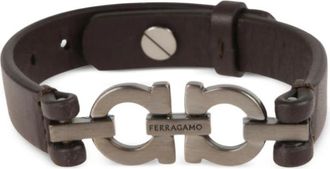 Ferragamo Bracciale Ferragamo. Design In Pelle, Decorato Con Doppio Logo Gancini In Finitura Rutenio. Chiusura Regolabile Con Perno