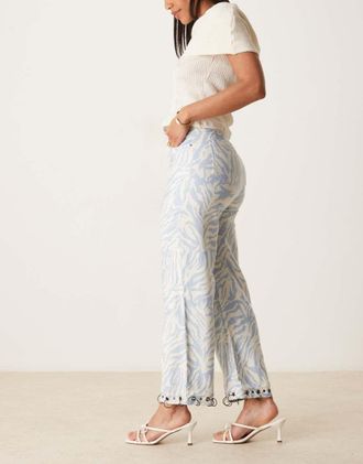 Ghospell Pantaloni blu con stampa zebrata e dettaglio a contrasto