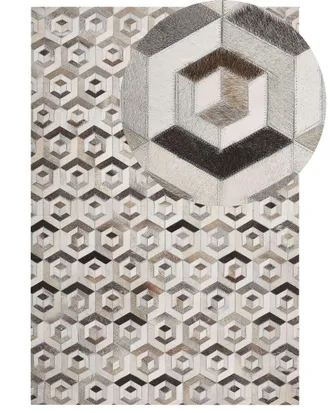 Beliani Beliani - Tappeto Rettangolare Pelle Beige Marrone Motivo Geometrico 140 X 200 Cm Tavak