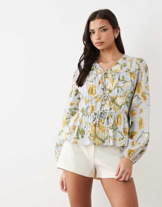 Vero Moda Top a maniche lunghe allacciato sul davanti in morbido cotone con stampa a fiori-Multi