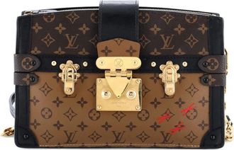 Louis Vuitton Trunk Reverse canvas clutch met monogram - Bruin
