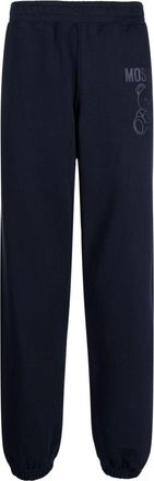 Moschino logo-print track pants - men - Organic Cotton - 46 - Blue
