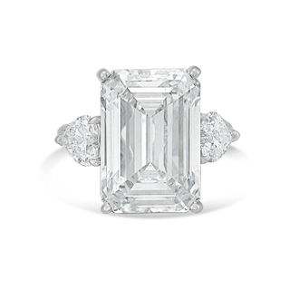 Diana M. Jewels Platinum Lab grown 5ct Emerald diamond ring with heart diamonds on the side and micropave band