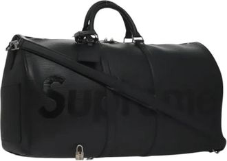Louis Vuitton Pre-owned Leather travel-bags - Dames - Vintage Weekendtas - Zwart - ONE Size - Leer - Vintage