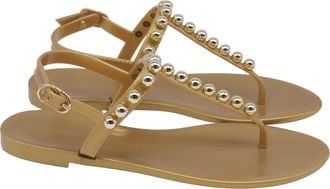 Stuart Weitzman Goldie Jelly Sandals in Gold PVC