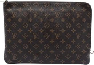 Louis Vuitton Pre-owned Clutches, female, Brown, Size: ONE SIZE Pre-owned Etui Voyage MM