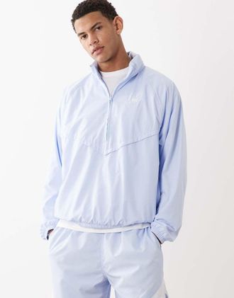 Nike Windrunner - Giacca leggera blu con zip corta
