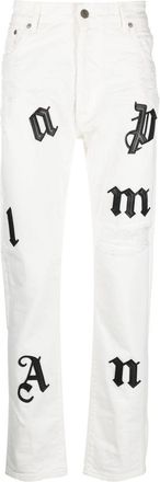 Palm Angels logo-patch distressed jeans - men - Calf Leather/Cotton/Cotton/Polyester/Polyurethane - 30 - White