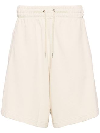 Maison Kitsun&eacute; Katoenen trainingsshorts met vosprint - Beige