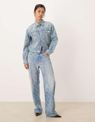 Calvin Klein Jeans Jeans dritti blu lavaggio chiaro con stampa del logo anni 90