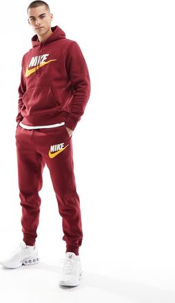 Nike Club chenille logo sweatpants in red