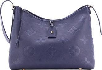 Louis Vuitton CarryAll Monogram Empreinte Giant MM hobo bag - Blauw
