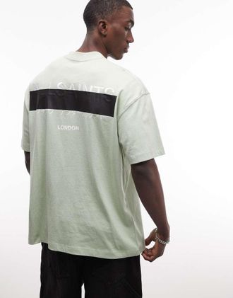 AllSaints Redact - T-shirt oversize verde chiaro con logo ricamato e stampa sul retro