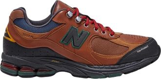 New Balance Leren sneakers met technische stofinzetten - Heren - Sneakers - Bruin - 41 1/2 EU - Schoenen