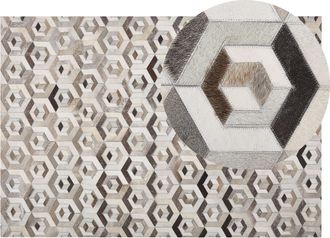 Beliani Beliani - Alfombra De Piel De Vacuno Beige Y Marr&oacute;n Rectangular 140 X 200 Cm Patchwork Patr&oacute;n Geom&eacute;trico Retro Tavak