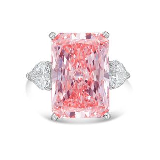 Diana M. Jewels Platinum Lab grown 6ct Fancy pink radiant diamond ring with heart diamonds on the side and micropave band