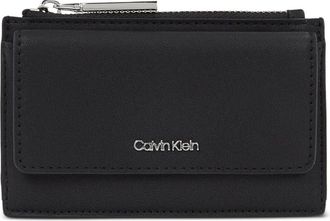 Calvin Klein flap-pocket zip-fastening wallet - women - Fabric - One Size - Black