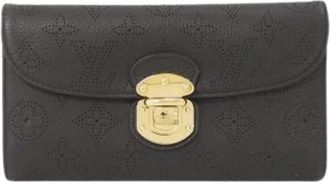 Louis Vuitton Pre-owned Mahina Tri-fold Portemonnee - Dames - Vintage Accessoires - Bruin - ONE Size - Leer - Vintage