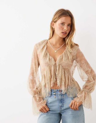 Mango blusa delicata in pizzo con volant e maniche lunghe color sabbia-Neutro