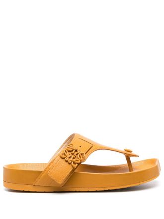 Loewe logo-plaque leather flip flops - Yellow
