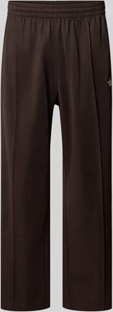 adidas Originals Straight Fit Sweatpants mit Logo-Stitching Modell Firebird in Dunkelbraun, Gr&ouml;&szlig;e XXL