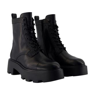 Tory Burch Monogram-embossed Lug Sole Ankle Boot - Black