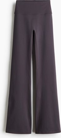 H&M Ausgestellte Yogaleggings mit SoftMove - Purple