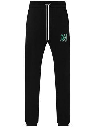 Amiri logo-motif organic cotton track pants - Black