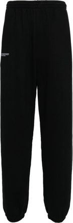 PANGAIA slogan-print organic cotton track pants - men - Organic Cotton - M - Black