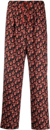 Viktor & Rolf all-over floral-print trousers - men - Triacetate/Polyester - S - Orange