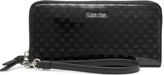 Calvin Klein Saffiano Continental Zip Around Wallet Key Item Saffiano Continental Zip Around Wallet With Wristlet Strap Calvin Klein Women, Black/Silver Patent Rel