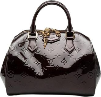 Louis Vuitton Pre-owned Handbags, female, Purple, Size: ONE SIZE Pre-owned The Montana