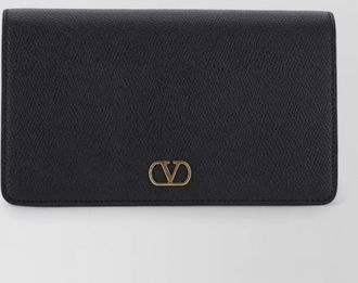 Valentino Garavani hand clutch bag detachable strap texture