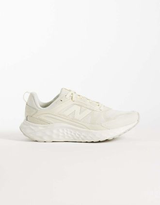 New Balance Arishi sneakers da corsa da donna in bianco sporco-Neutro