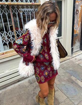Never Fully Dressed minigonna a maglia fine a vita alta co-ord con stampa bordeaux-Rosso